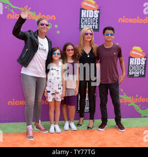 Former professional soccer player Abby Wambach (L) and her spouse, author Glennon Doyle Melton and guests attend Nickelodeon's Kids' Choice Sports Awards 2017 at UCLA's Pauley Pavilion in Los Angeles on July 13, 2017.  Photo by Jim Ruymen/UPI Stock Photo