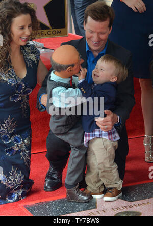 American ventriloquist and comedian Jeff Dunham and his wife Audrey Dunham look on as their son James gets playful with his puppet Walter during an unveiling ceremony honoring him with the 2,619th star on the Hollywood Walk of Fame in Los Angeles on September 21, 2017. Photo by Jim Ruymen/UPI Stock Photo