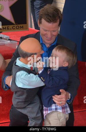 American ventriloquist and comedian Jeff Dunham looks on as his son James gets playful with Walter the puppet during an unveiling ceremony honoring him with the 2,619th star on the Hollywood Walk of Fame in Los Angeles on September 21, 2017. Photo by Jim Ruymen/UPI Stock Photo