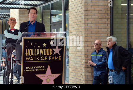 American ventriloquist and comedian Jeff Dunham makes comments as Howie Mandel (C) and Jay Leno look on during an unveiling ceremony honoring him with the 2,619th star on the Hollywood Walk of Fame in Los Angeles on September 21, 2017. Photo by Jim Ruymen/UPI Stock Photo