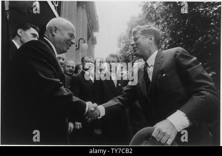 Khrushchev and Kennedy Shaking Hands; Scope and content:  Photograph of President John F. Kennedy and Chairman Nikita Khrushchev during their meeting in Vienna, Austria. Stock Photo