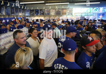 Dodger fans pack the merchandise store during pre game festivities