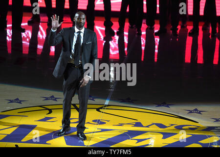 Former Laker Kobe Bryant waves to the crowd during his jersey retirement ceremony at Staples Center in Los Angeles December 18 2017. Photo by Jon SooHoo UPI Stock Photo Alamy