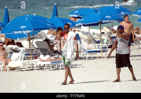 baby mama Nicole Alvarez continued her vacation at the the pool in Miami with and their young son. Nicole Alvarez looked to have several marks of what appeared to be bruises on her body. Baby daddy Dr. Murray was no where to be found. Cardiologist Conrad Murray was reportedly paid $150,000 per month to act as Michael Jackson's personal physician. He prescribed inordinately high levels of propofol to Jackson, allegedly causing the singer's death. On July 31, 2010 in Miami, Florida. People: Nicole Alvarez Credit: Storms Media Group/Alamy Live News Stock Photo