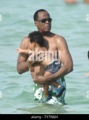 baby mama Nicole Alvarez continued her vacation at the the pool in Miami with and their young son. Nicole Alvarez looked to have several marks of what appeared to be bruises on her body. Baby daddy Dr. Murray was no where to be found. Cardiologist Conrad Murray was reportedly paid $150,000 per month to act as Michael Jackson's personal physician. He prescribed inordinately high levels of propofol to Jackson, allegedly causing the singer's death. On July 31, 2010 in Miami, Florida. People: Nicole Alvarez Credit: Storms Media Group/Alamy Live News Stock Photo