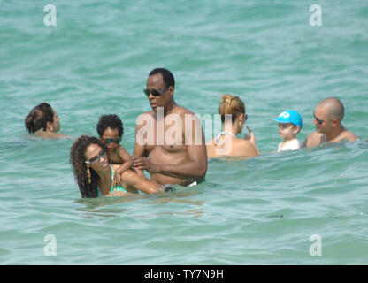 baby mama Nicole Alvarez continued her vacation at the the pool in Miami with and their young son. Nicole Alvarez looked to have several marks of what appeared to be bruises on her body. Baby daddy Dr. Murray was no where to be found. Cardiologist Conrad Murray was reportedly paid $150,000 per month to act as Michael Jackson's personal physician. He prescribed inordinately high levels of propofol to Jackson, allegedly causing the singer's death. On July 31, 2010 in Miami, Florida. People: Nicole Alvarez Credit: Storms Media Group/Alamy Live News Stock Photo