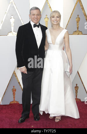 Walt Disney Company CEO Bob Iger and Willow Bay arrive on the red carpet for the 90th annual Academy Awards at the Dolby Theatre in the Hollywood section of Los Angeles on March 4, 2018. Photo by John Angelillo/UPI Stock Photo