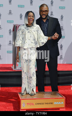 Director, screenwriter and actor Tyler Perry (R) and screen legend Cicely Tyson attend the hand and footprint ceremony honoring Tyson at the TCL Chinese Theatre in Hollywood during the 9th annual TCM Classic Film Festival on April 27, 2018. Photo by Chris Chew/UPI Stock Photo