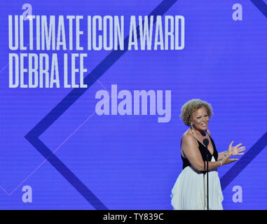 Debra L. Lee (L) accepts the BET Ultimate Icon Award during the 18th annual BET Awards at Microsoft Theater in Los Angeles on June 24, 2018. The ceremony celebrates achievements in entertainment and honors music, sports, television, and movies released between April 1, 2017 and March 31, 2018.   Photo by Jim Ruymen/UPI Stock Photo