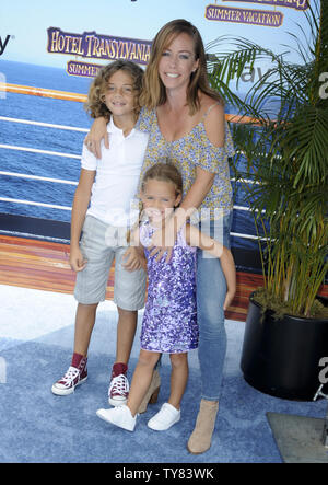 Kendra Wilkinson, Alijah Baskett and Hank Baskett IV celebrating the ...