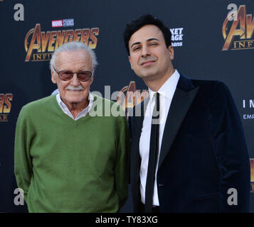 Marvel's Stan Lee (L) and Keya Morgan attend the April premiere of 'Avengers: Infinity War' in Los Angeles. Morgan, who until recently was managing Lee's affairs is currently under investigation for elder abuse. In a related case, Morgan's attorney entered a not guilty plea  Monday on behalf of his client, who is charged with calling 911 to report that authorities conducting a welfare check on the 95-year-old Lee were burglars.    File Photo by Jim Ruymen/UPI Stock Photo