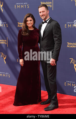 (L-R) Actress Tiffani Thiessen and husband Brady Smith attend the Creative Arts Emmy Awards at the Microsoft Theater in Los Angeles on September 8, 2018.    Photo by Gregg DeGuire/UPI Stock Photo