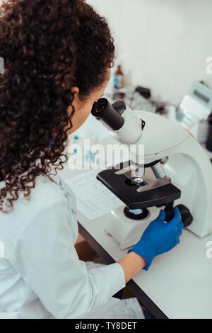 Intelligent female biologist working on her project Stock Photo