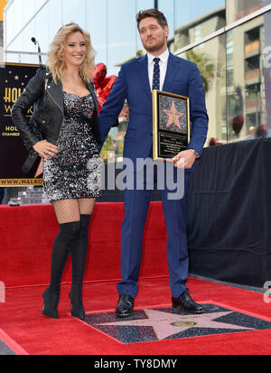 Michael Buble (R) and his wife Luisana Lopilato attend the star unveiling ceremony honoring Buble with the 2,650th star on the Hollywood Walk of Fame in Los Angeles, California on November 16, 2018. Photo by Chris Chew/UPI Stock Photo
