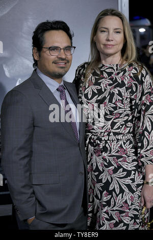 Cast member Michael Pena and his wife Brie Shaffer attends the premiere of the motion picture crime thriller 'The Mule' at the Regency Village Theatre in the Westwood section of Los Angeles on December 10, 2018. The film tells the true story of a 90-year-old horticulturist and WWII veteran who is caught transporting $3 million worth of cocaine through Michigan for a Mexican drug cartel.  Photo by John McCoy/UPI Stock Photo