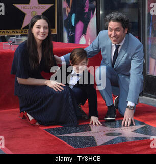 Venezuelan conductor and violinist Gustavo Adolfo Dudamel Ram’rez is joined by his wife, actress Maria Valverde Rodriguez and his son Martin Dudamel Maturen during an unveiling ceremony honoring him with the 2,654th star on the Hollywood Walk of Fame in Los Angeles on January 22, 2019. Dudamel is the music director of the Orquesta Sinfonica Simon Bol’var and the Los Angeles Philharmonic.  Photo by Jim Ruymen/UPI. Stock Photo