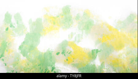 Light yellow and light green abstract art background dyed on rice paper Stock Photo