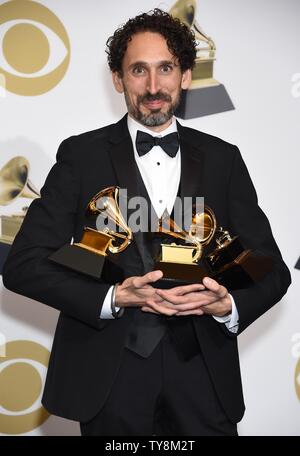 John Daversa appears backstage with his awards for Best Improvised Jazz Solo for 'Don't Fence Me In', Best Large Jazz Ensemble Album for 'American Dreamers: Voices Of Hope, Music Of Freedom', and Best Arrangement, Instrumental Or A Cappella for 'Stars And Stripes Forever',  during the 61st annual Grammy Awards held at Staples Center in Los Angeles on February 10, 2019.  Photo by Gregg DeGuire/UPI Stock Photo