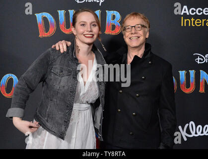 American composer and songwriter Danny Elfman and his wife Mali Elfman attend the premiere of the motion picture fantasy 'Dumbo' at the Ray Dolby Ballroom, Loews Hollywood Hotel in the Hollywood section of Los Angeles on March 11, 2019. Storyline: A young elephant, whose oversized ears enable him to fly, helps save a struggling circus, but when the circus plans a new venture, Dumbo and his friends discover dark secrets beneath its shiny veneer.  Photo by Jim Ruymen/UPI Stock Photo