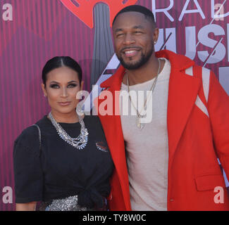 (L-R) Zena Foster and Tank arrive for the sixth annual iHeartRadio Music Awards at the Microsoft Theater in Los Angeles, California on March 14, 2019. The annual award show will broadcast live  on FOX.  Photo by Jim Ruymen/UPI Stock Photo