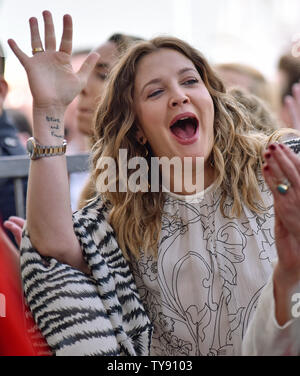 Drew Barrymore cheers for Lucy Liu during the star unveiling ceremony honoring Liu with the 2,662nd star on the Hollywood Walk of Fame in Los Angeles, California on May 1, 2019. Photo by Chris Chew/UPI Stock Photo