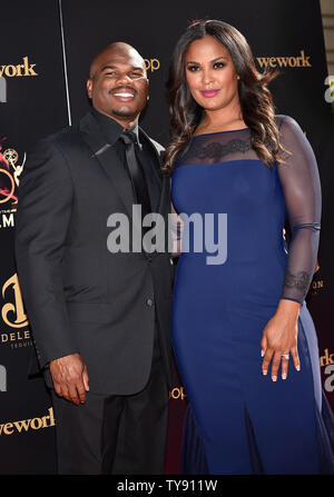 Laila Ali (R) and her husband Curtis Conway arrive on the red carpet for the 46th Annual Daytime Creative Arts Emmy Awards at the Pasadena Civic Auditorium in Pasadena, California on May 3, 2019. Photo by Chris Chew/UPI Stock Photo