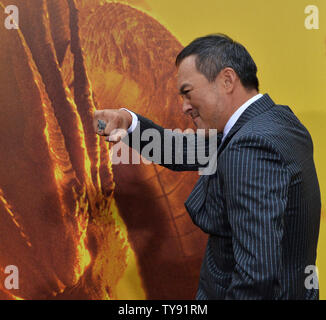 Cast member Ken Watanabe attends the premiere of the sci-fi motion picture 'Godzilla: King of the Monsters' with her husband Renn Hawkey and their daughter Gytta Lubov Hawkey and son Fynn Hawkey at the TCL Chinese Theatre in the Hollywood section of Los Angeles on May 18, 2019. The film tells the story of the crypto-zoological agency Monarch faceing off against a battery of god-sized monsters, including the mighty Godzilla, who collides with Mothra, Rodan, and his ultimate nemesis, the three-headed King Ghidorah.  Photo by Jim Ruymen/UPI Stock Photo