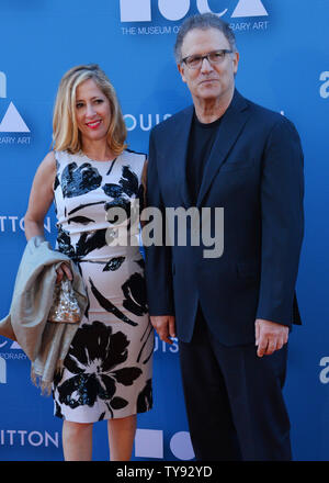 Actor Albert Brooks (R) and his wife, artist Kimberly Shlain attend the 2015 Museum of Contemporary Arts gala presented by Louis Vuitton at the Geffen Contemporary at MOCA in Los Angeles on May 30, 2015. MOCA is a not-for-profit institution that relies on a variety of funding sources for its activities.  Photo by Jim Ruymen/UPI Stock Photo