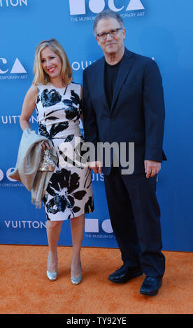 Actor Albert Brooks (R) and his wife, artist Kimberly Shlain attend the 2015 Museum of Contemporary Arts gala presented by Louis Vuitton at the Geffen Contemporary at MOCA in Los Angeles on May 30, 2015. MOCA is a not-for-profit institution that relies on a variety of funding sources for its activities.  Photo by Jim Ruymen/UPI Stock Photo