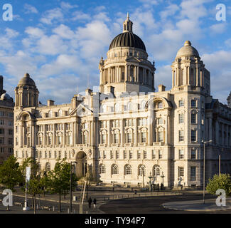 The Port of Liverpool Building, part of the pier head area of the River Mersey waterfront, comprising three buildings, known as The Three Graces. Stock Photo
