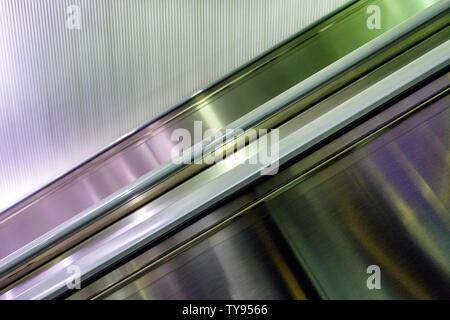 Side corridor escalator in metro at urban city Stock Photo