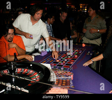 Gamblers from all walks of life enjoy a variety of gaming options. Pictured here are roulette players at the Hard Rock Hotel and casino in Las Vegas, Nevada on September 15, 2007. (UPI Photo/Daniel Gluskoter) Stock Photo