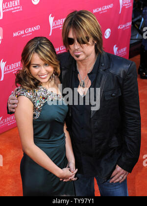 Miley Cyrus and her father Billy Ray Cyrus arrives for the 44th Annual Academy of Country Music Awards at the MGM Grand in Las Vegas, Nevada on April 5, 2009. (UPI Photo/Kevin Dietsch) Stock Photo