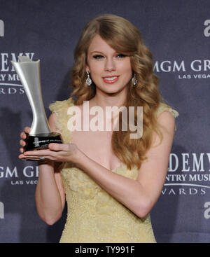 American country music have crowned a pair of new queens, barraging Miranda Lambert with four major honors for her hit 'The House That Built Me'. while the public voted superstar Taylor Swift (pictured) as the Entertainer of the Year. Swift appears backstage with her award at the 46th annual Academy of Country Music Awards in Las Vegas on April 3, 2011.  UPI/Jim Ruymen Stock Photo