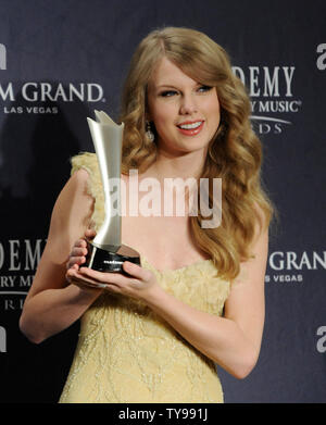 American country music have crowned a pair of new queens, barraging Miranda Lambert with four major honors for her hit 'The House That Built Me'. while the public voted superstar Taylor Swift (pictured) as the Entertainer of the Year. Swift appears backstage with her award at the 46th annual Academy of Country Music Awards in Las Vegas on April 3, 2011.  UPI/Jim Ruymen Stock Photo