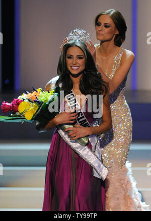 Miss Rhode Island Olivia Culpo, left, is crowned the 2012 Miss USA by the 2011 Miss USA Alyssa Campanella during the 2012 Miss USA competition at the Planet Hollywood Resort and Casino in Las Vegas, Nevada on June 3, 2012.  UPI/David Becker Stock Photo