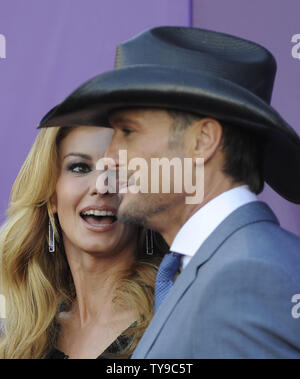 (L-R) Singers Faith Hill and Tim McGraw arrive at the 48th annual Academy of Country Music Awards at the MGM Hotel in Las Vegas, Nevada on April 7, 2013. UPI/David Becker Stock Photo