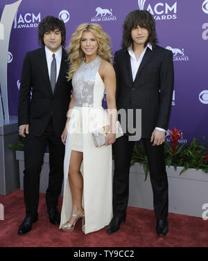 (L-R) Musicians Neil Perry, Kimberly Perry and Reid Perry of The Band Perry arrive at the 48th annual Academy of Country Music Awards at the MGM Hotel in Las Vegas, Nevada on April 7, 2013. UPI/David Becker Stock Photo