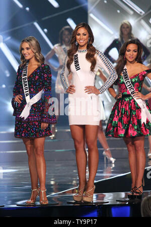 Miss South Dakota USA, Madison McKeown, Miss Hawaii USA, Chelsea Hardin and Miss Connecticut USA, Tiffany Teixeira onstage during the Miss USA Pageant competition at T-Mobile Arena in Las Vegas, Nevada on June 5, 2016. Photo by James Atoa/UPI Stock Photo