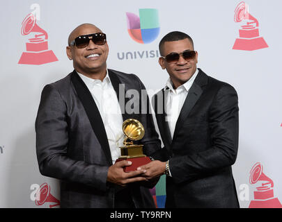 Alexander Delgado (L) and Randy Malcom Martinez of Gente de Zona appear backstage with the award for best tropical fusion album for 'Visualizate' during the 17th annual Latin Grammy Awards at T-Mobile Arena in Las Vegas, Nevada on November 17, 2016.  Photo by Jim Ruymen/UPI Stock Photo