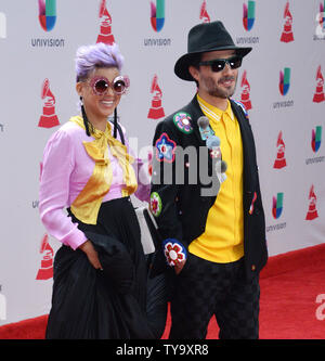 Liliana Saumet (L) and Simon Mejia of Bomba Estereo arrive on the red carpet for the 18th annual Latin Grammy Awards at the MGM Garden Arena in Las Vegas, Nevada on November 16, 2017.  Photo by Jim Ruymen/UPI Stock Photo