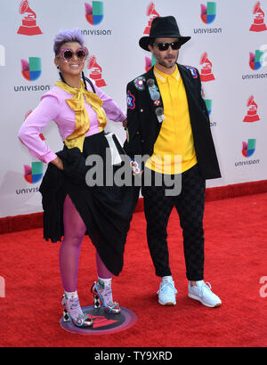 Liliana Saumet (L) and Simon Mejia of Bomba Estereo arrive on the red carpet for the 18th annual Latin Grammy Awards at the MGM Garden Arena in Las Vegas, Nevada on November 16, 2017.  Photo by Jim Ruymen/UPI Stock Photo