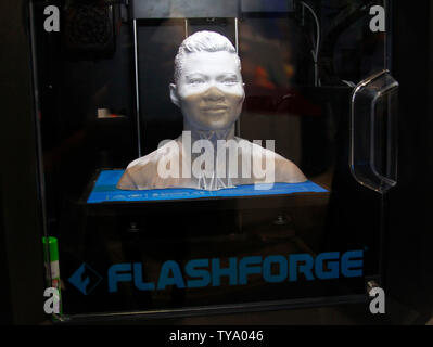 A 3D printer by Flashforge prints a plastic bust from a photograph during the 2018 International CES, at the Las Vegas Convention center in Las Vegas, Nevada, January 10, 2018. Photo by James Atoa/UPI Stock Photo