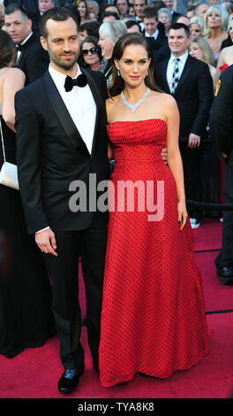 Natalie Portman and her husband Benjamin Millepied arrive on the red carpet for the 84th Academy Awards in the Hollywood section of Los Angeles on February 26, 2012. UPI/Kevin Dietsch Stock Photo