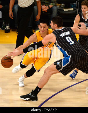 Los Angeles Lakers guard Jeremy Lin (17) is stripped of ball by Orlando Magic center Nikola Vucevic (9) during the first half of their NBA game at Staples Center in Los Angeles, January 9, 2015. The Lakers beat the Magic 101-84.   UPI/Jon SooHoo Stock Photo
