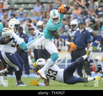 The Los Angeles Chargers are stopped on the goal line by the Las Vegas ...