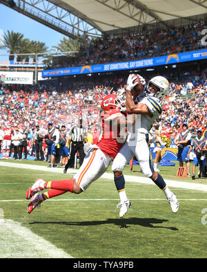 Kansas City Chiefs vs. Los Angeles Chargers. Fans support on NFL Game.  Silhouette of supporters, big screen with two rivals in background Stock  Photo - Alamy