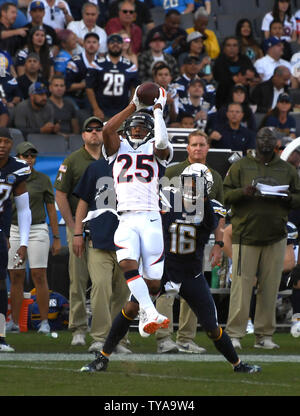 Broncos' cornerback Chris Harris Jr (25) intercepts pass in front of   Chargers' receiver Tyrell Williams (16) at StubHub Center in Carson, California on November 18, 2018. Photo by Jon SooHoo/UPI Stock Photo