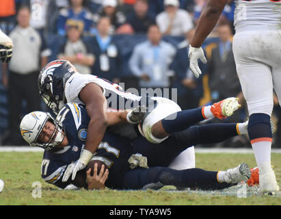 Chargers' quarterback Phillip Rivers is sacked by Broncos linebacker Von Miller at StubHub Center in Carson, California on November 18, 2018. Photo by Jon SooHoo/UPI Stock Photo