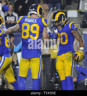 Tyler Higbee of the Los Angeles Rams celebrates after making a